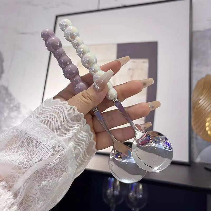 真珠のハンドルが付いたステンレス鋼の攪拌スプーン、カトラリー - Quirky Kitchen Gadgets のレビューと価格